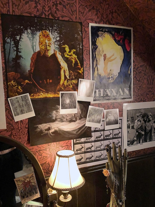 A peek inside Sabrina’s bedroom, which Lisa Soper said was designed to reflect duality and conflict. There’s also a Friday the 13th-esque poster, which Soper said is Sabrina’s original work.